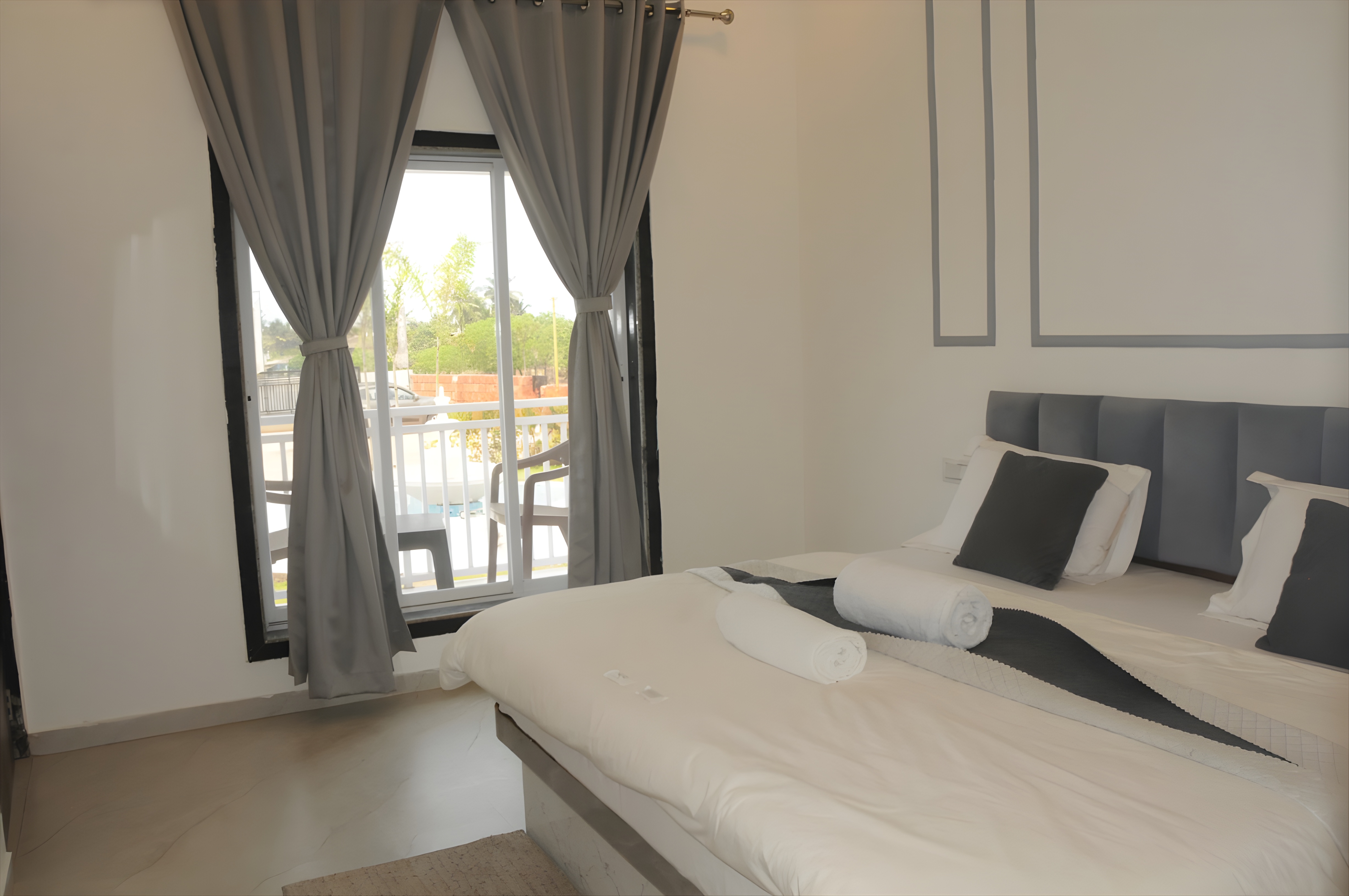 Deluxe AC Room with Balcony at Zista Inn Shrivardhan
